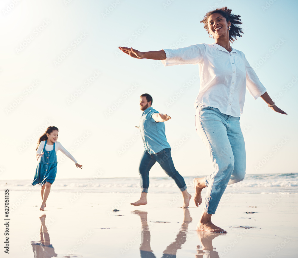 Mother, father and daughter on the beach to dance together while outdoor for travel or vacation in s