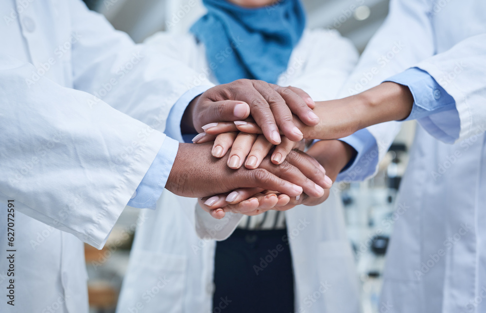 Closeup, hands and group in a hospital, healthcare or scientists with support, motivation or solidar