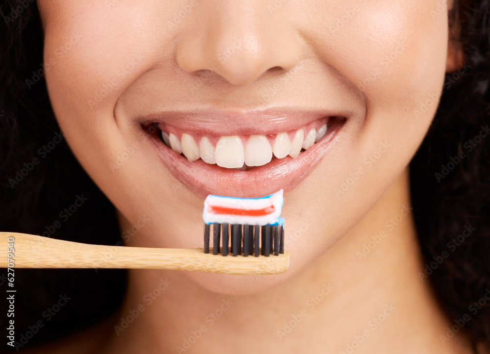 Smile, wood toothbrush and studio closeup for dental wellness, woman and healthy mouth by pink backg