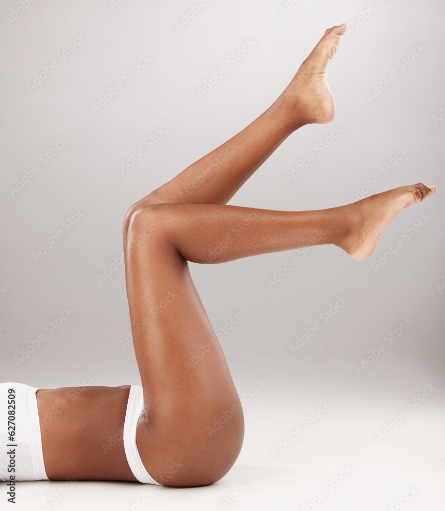 Closeup, fitness and woman with skincare, legs or epilation against a white studio background. Zoom,