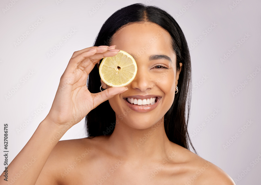 Happy woman, portrait and lemon for natural vitamin C, citrus or healthy nutrition against a grey st