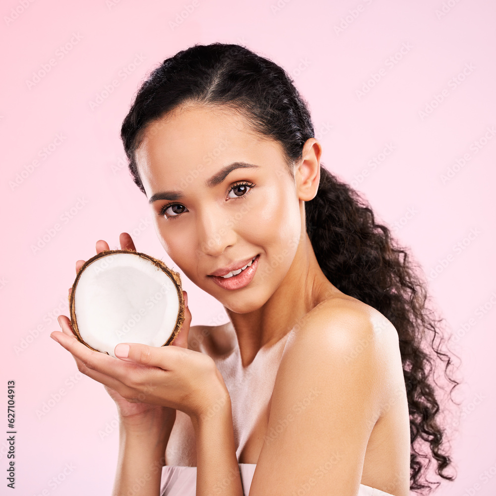 Woman, portrait and coconut fruit skincare, beauty or vegan cream on pink studio background. Face of