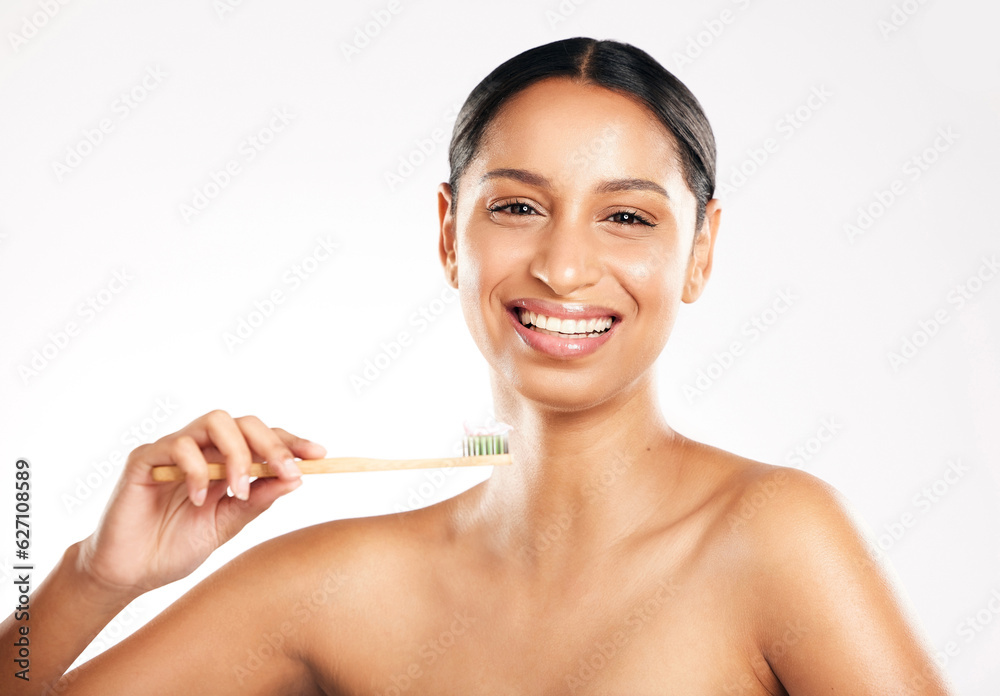 Happy woman, portrait and toothbrush for teeth, dental or clean hygiene against a white studio backg