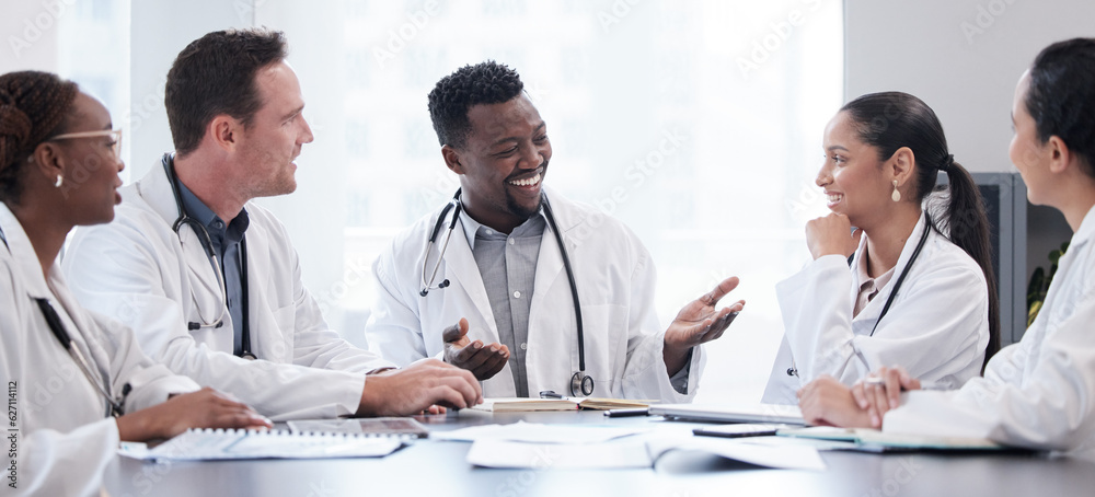 Healthcare, meeting and collaboration with a team of doctors in a hospital boardroom for discussion.