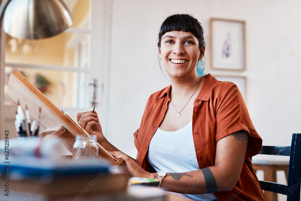 Im happiest when I have a paint brush in my hand. Portrait shot of an unrecognizable woman working o