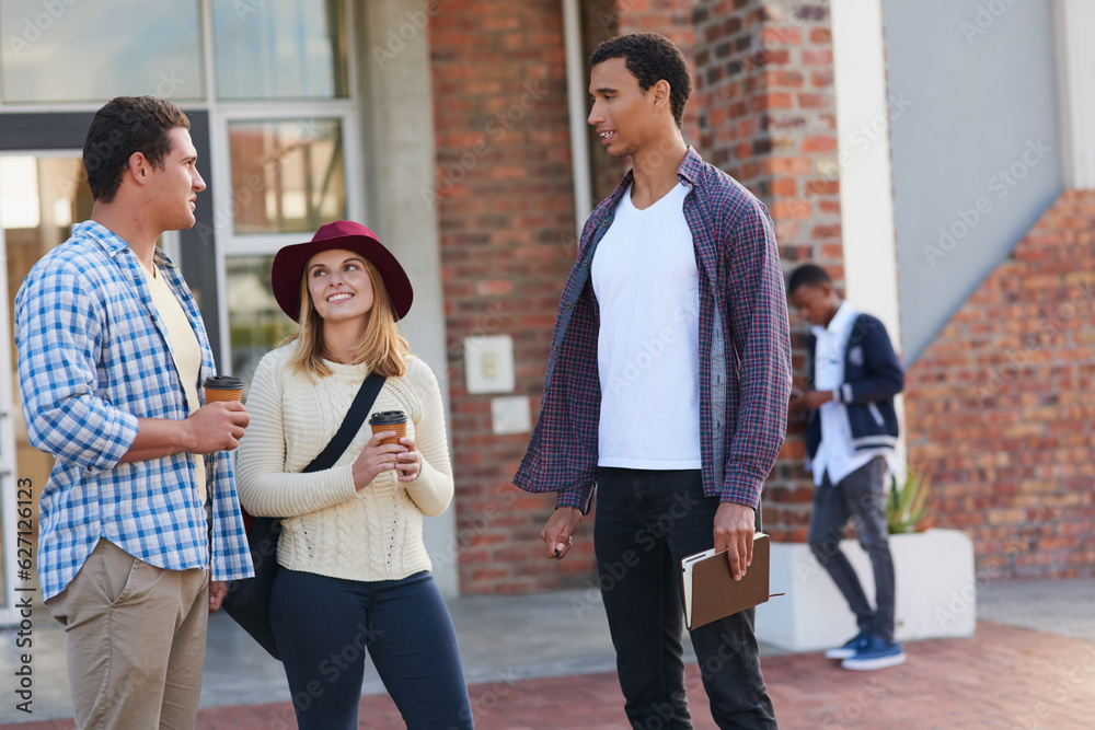 Catching up before class. Cropped shot of a group of university students hanging out between class.