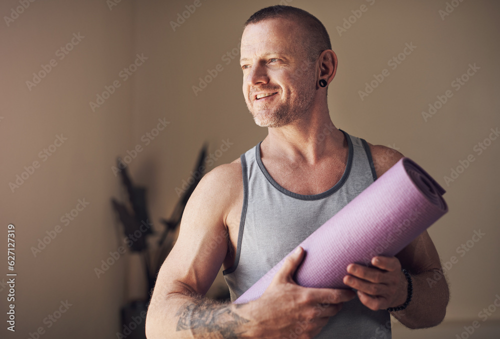 Yoga helps me slow down and appreciate life. Cropped shot of a handsome young man standing alone and