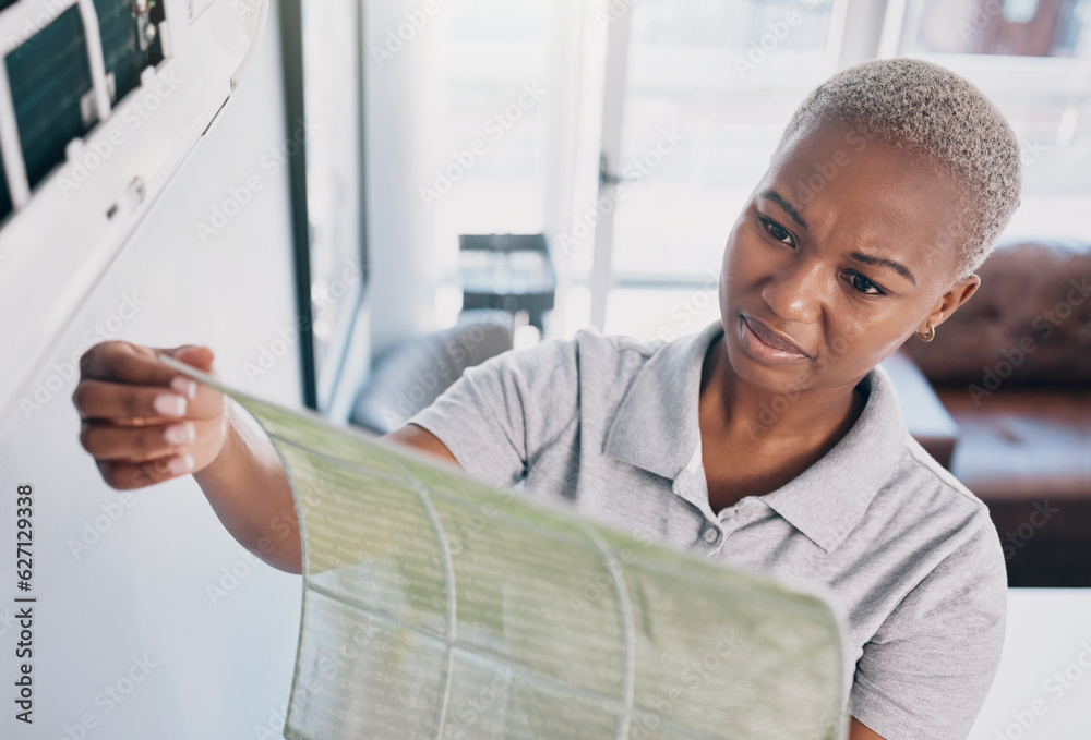 Dirty, cleaning and a black woman with a wall cover for maintenance, building or home renovation. Du