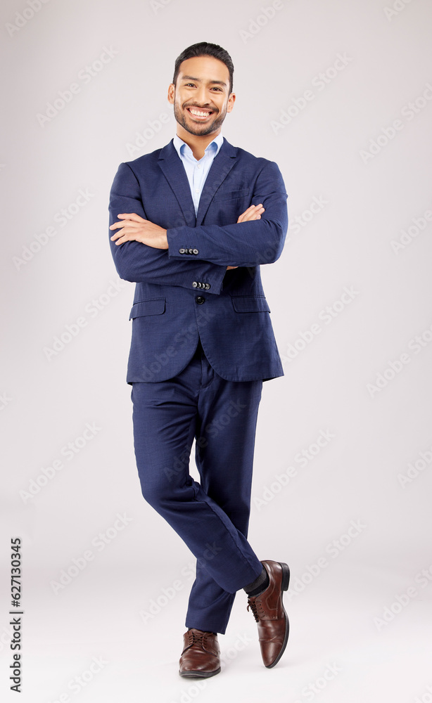 Business man, arms crossed and smile in studio portrait for pride, success or suit by white backgrou