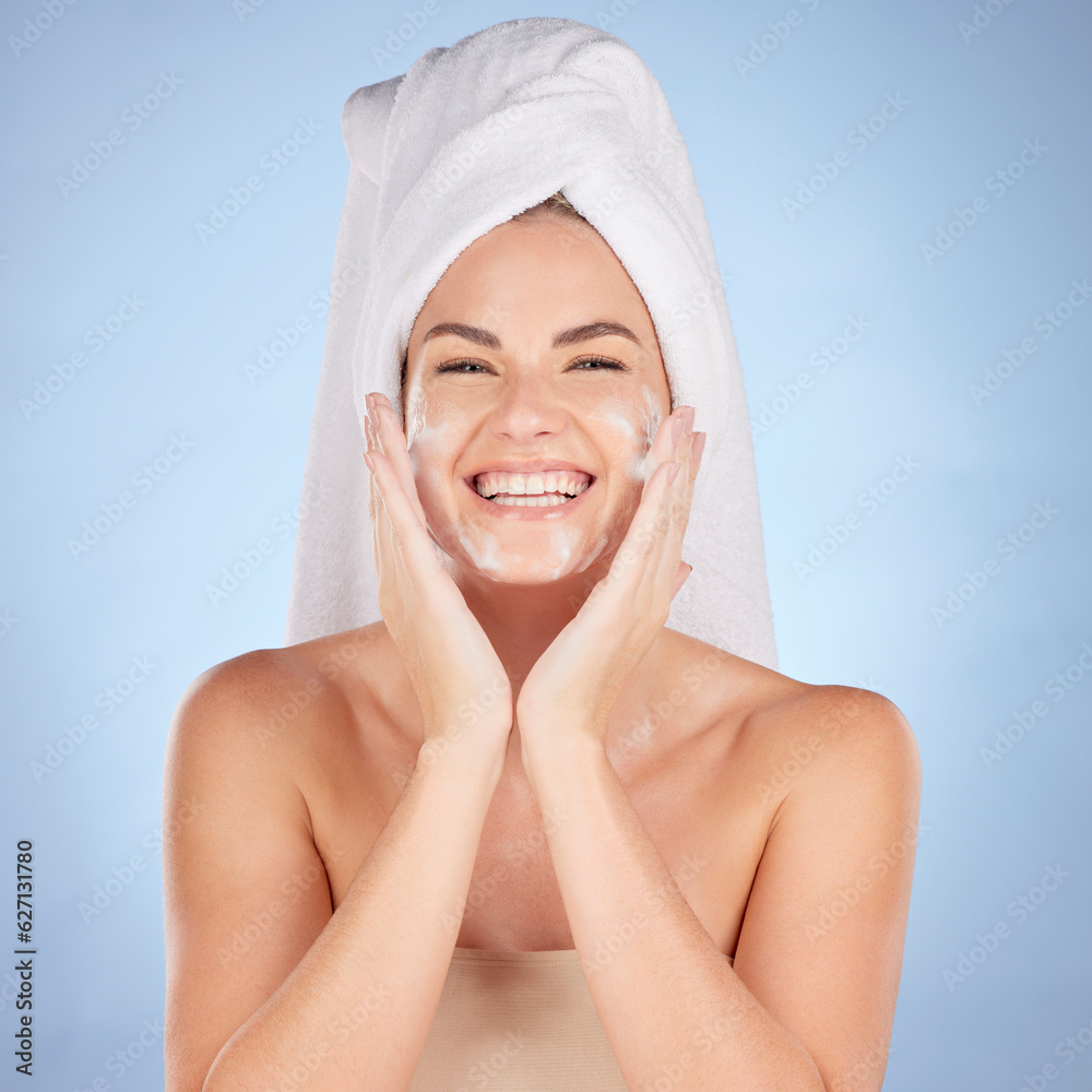 Shower, portrait and woman washing face with soap in studio, blue background and cleaning cosmetics.