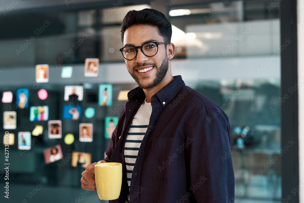 Caffeine helps me get through the day. Cropped portrait of a handsome young businessman wearing spec