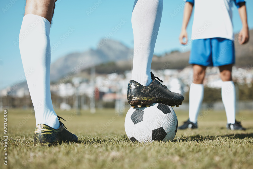 Soccer, legs and foot on ball for match, game or start on the green grass field in nature outdoors. 