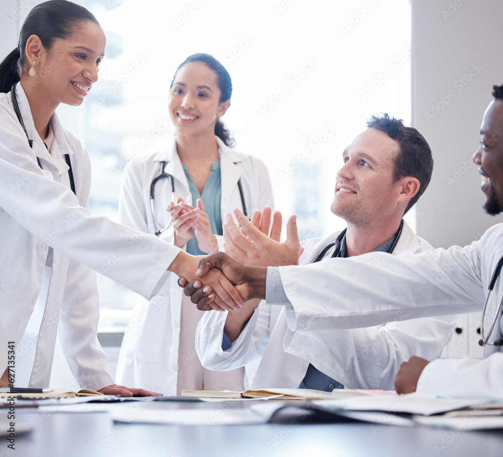 Doctors, staff or meeting with handshake, applause or congratulations with healthcare innovation, we