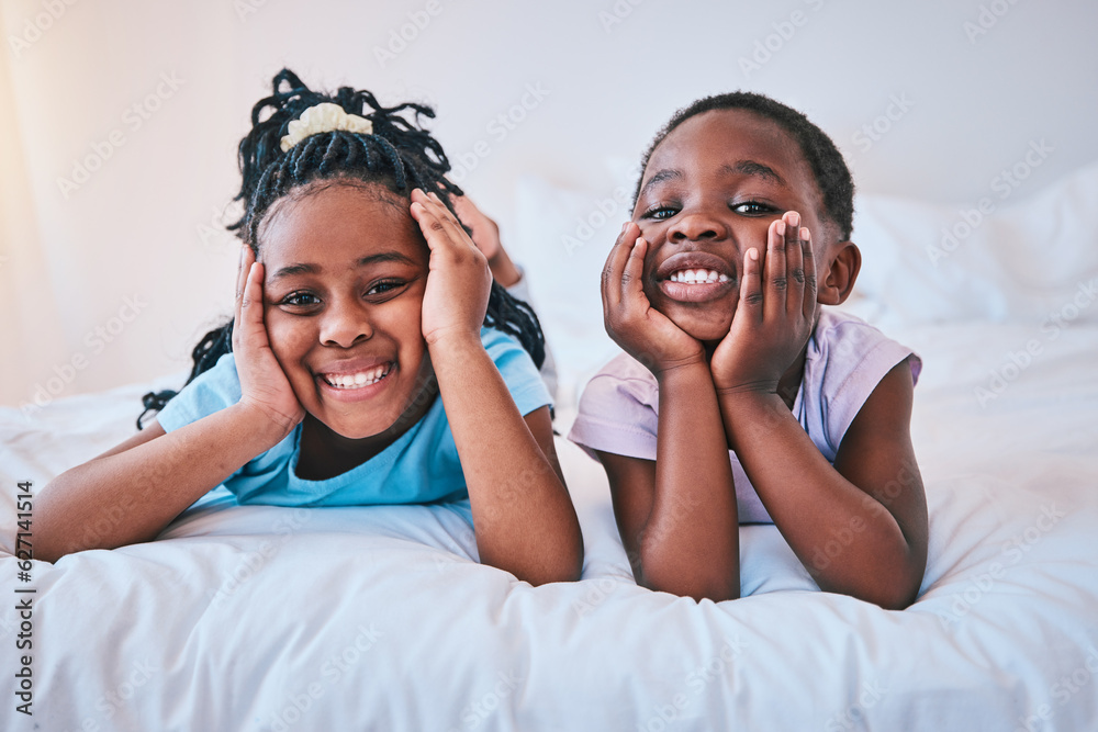 Happy, relax and portrait of children on the bed for playing, bonding and quality time in the mornin