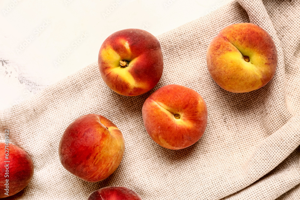 Sweet peaches on white background