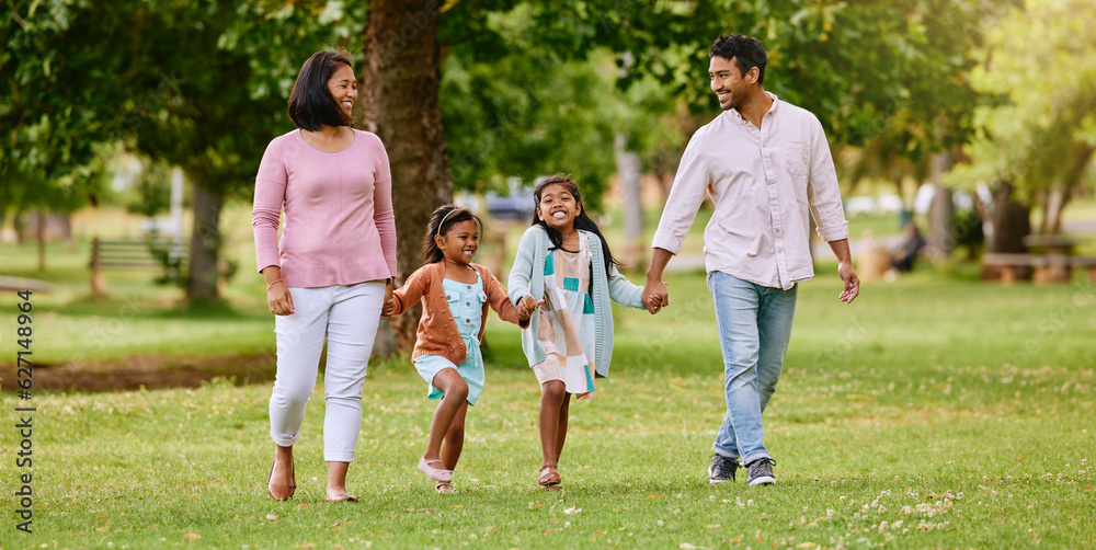 Park, walk and happy family holding hands, talking and bonding with love, smile and fun in nature. C