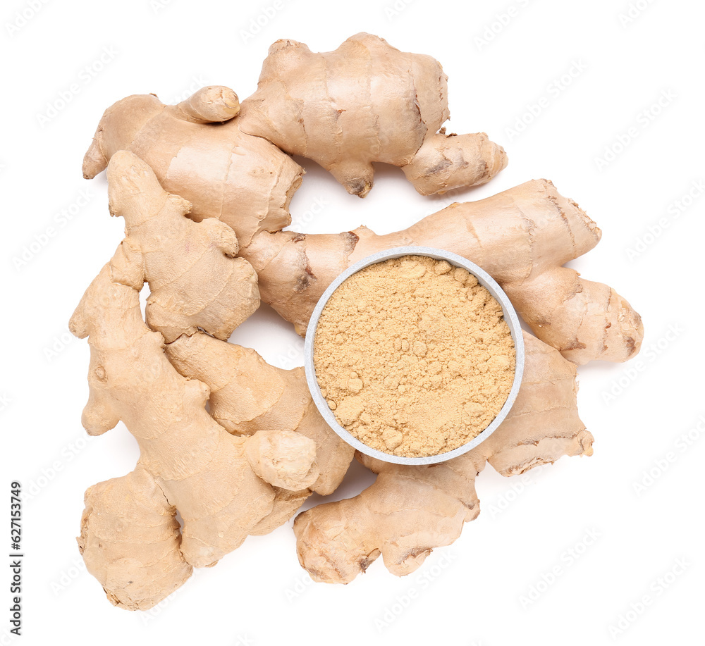 Fresh ginger roots and bowl with dried powder on white background