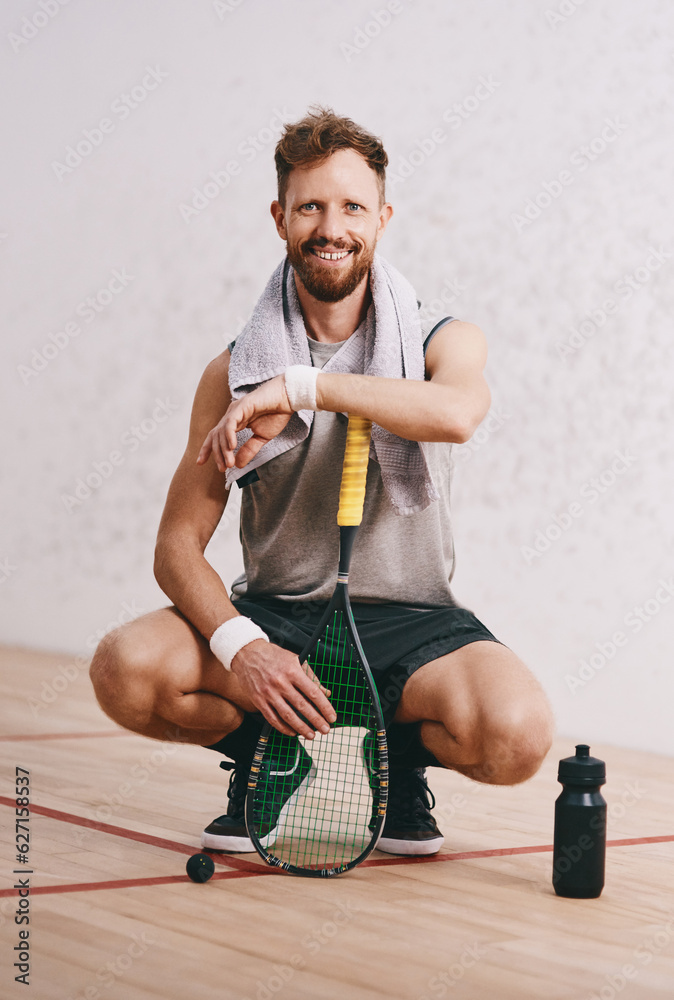 .Portrait of a young man taking a break after playing a game of squash.