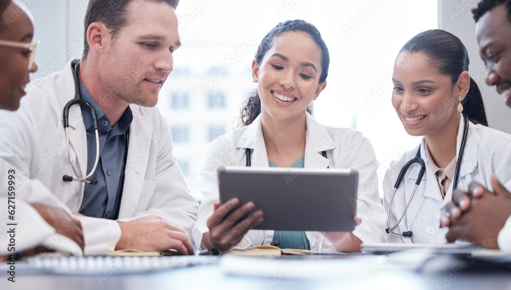 Healthcare, tablet and collaboration with a team of doctors in the hospital boardroom for a meeting.