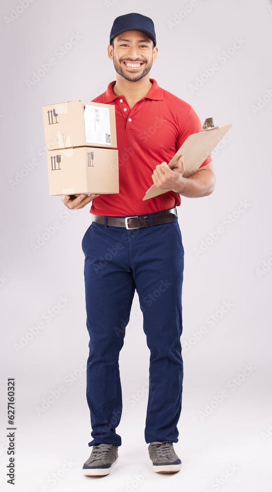 Happy asian man, portrait and box in delivery with clipboard for checklist against a white studio ba