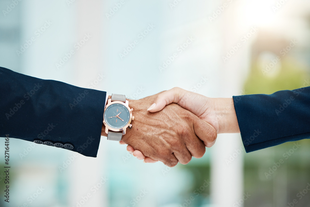 Closeup, business and handshake with agreement, deal and contract with partnership, collaboration or