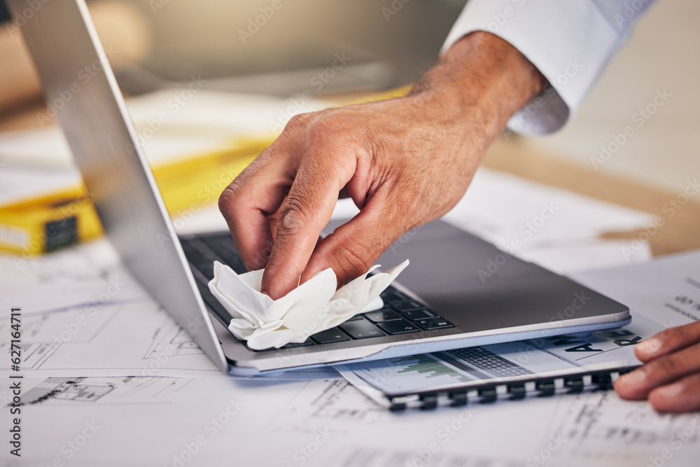 Hand with cloth, keyboard on laptop and cleaning dust or dirt from workspace with blueprint and arch