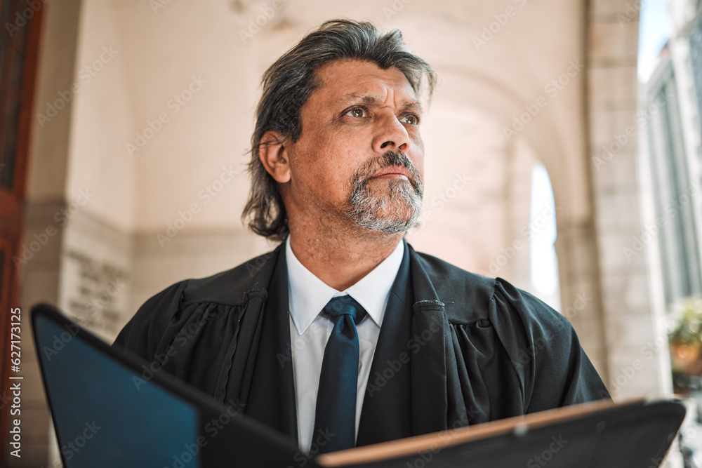 Thinking, book and a senior man judge at court, outdoor in the city during recess from a legal case 