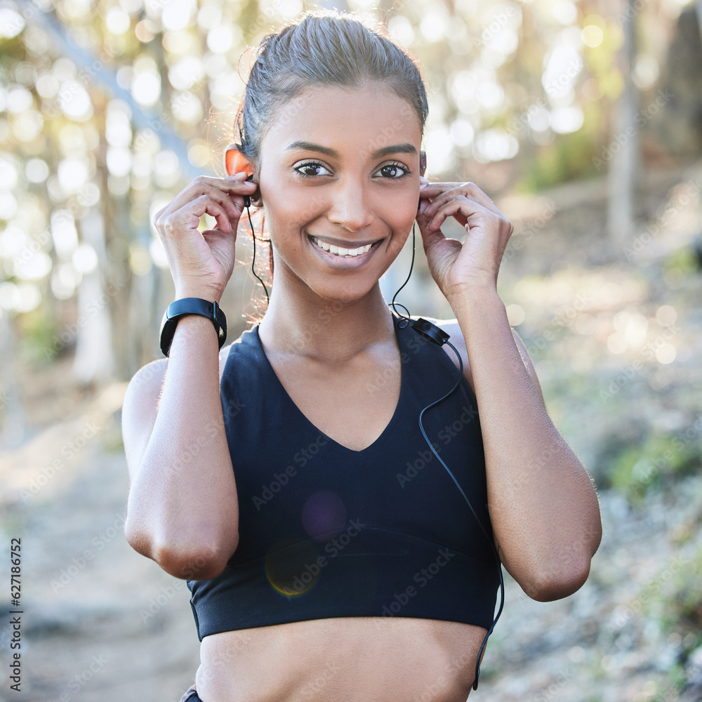 Fitness, earphones and portrait of a woman in nature after running for race or marathon training. Sp