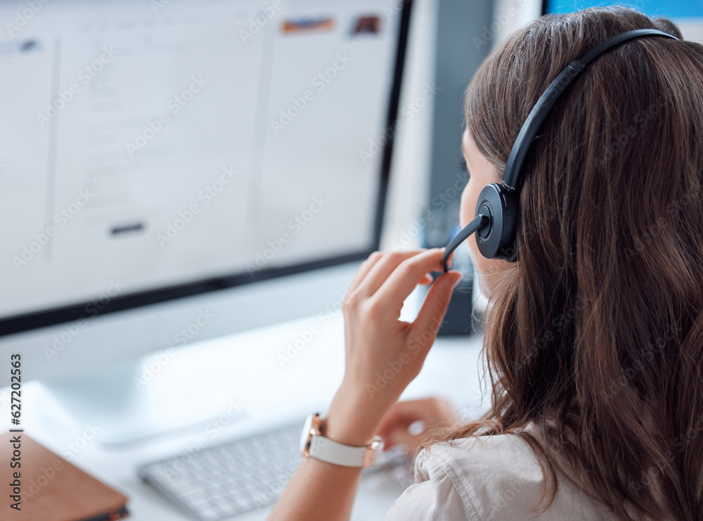 Customer support, call center and back of female agent working on online consultation in the office.