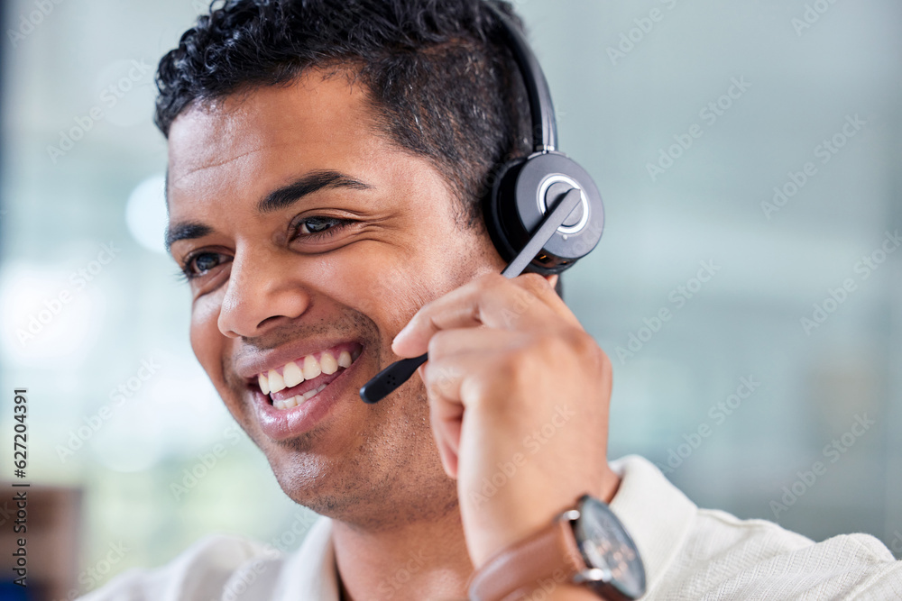 Happy, smile and male customer service consultant working on an online consultation in the office. C