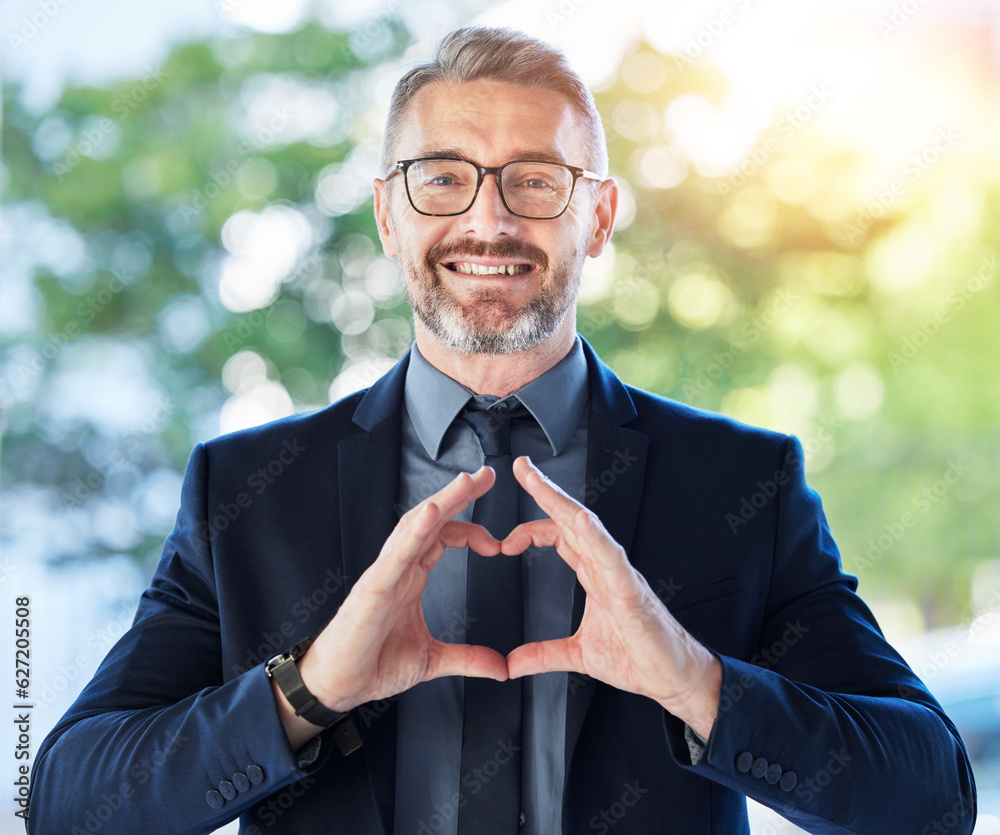 Face, business man and ceo with heart hands outdoor for trust, care and happy. Portrait, mature with