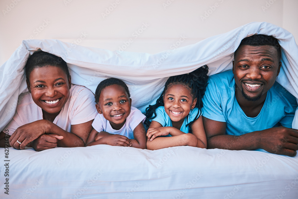 Happy, black family and portrait in a bed with blanket, relax and comfort on the weekend in their ho