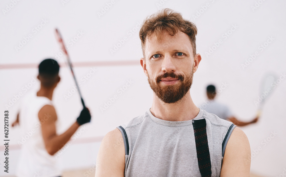 Bring your best and Ill bring mine. Portrait of a young man playing a game of squash with his team m