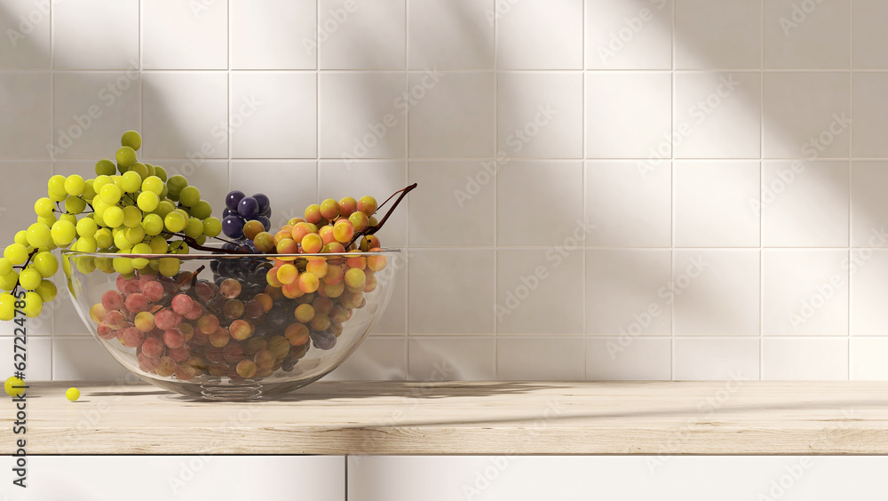 Wood countertop kitchen white cabinet counter, grape fruit in glass bowl in sunlight, leaf shadow on