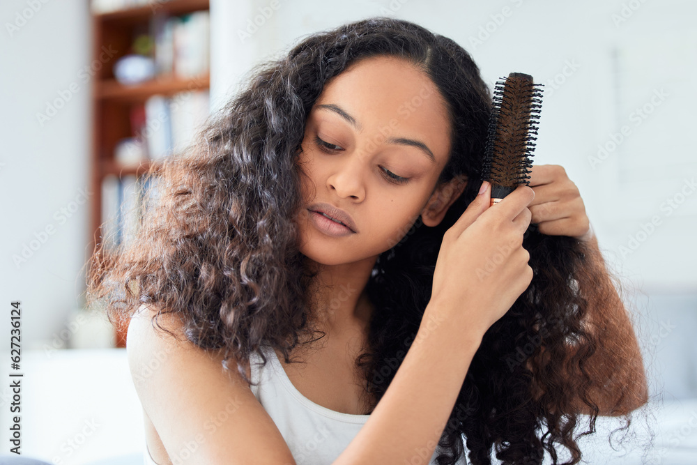 Brushing hair, woman and morning routine at home with care and grooming. Bathroom, relax female pers