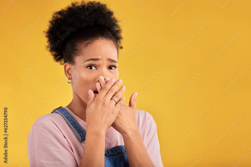 Shocked, surprise and portrait of woman with wow reaction to news isolated in a yellow studio backgr