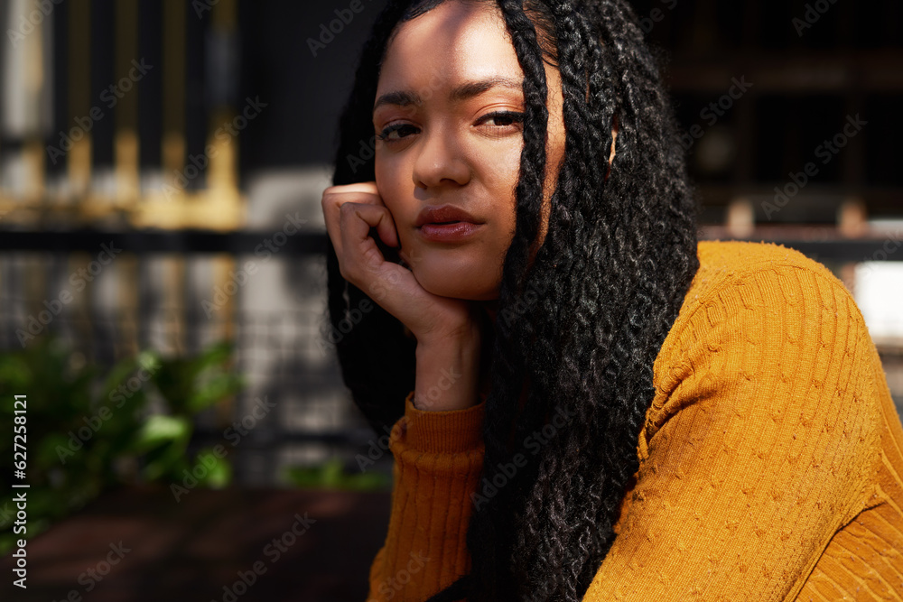 Today should be all about you. Cropped shot of a beautiful young woman out in the city during the da