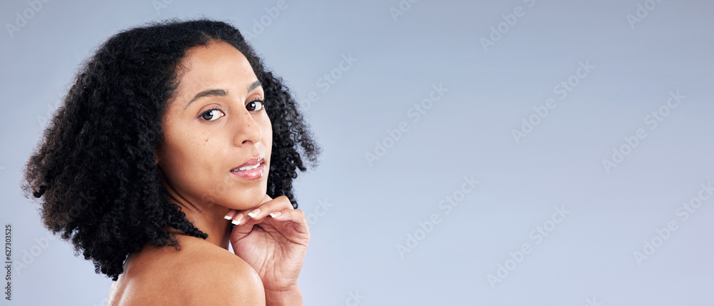 Portrait, skincare and space with a model black woman in studio on a gray background for beauty. Fac