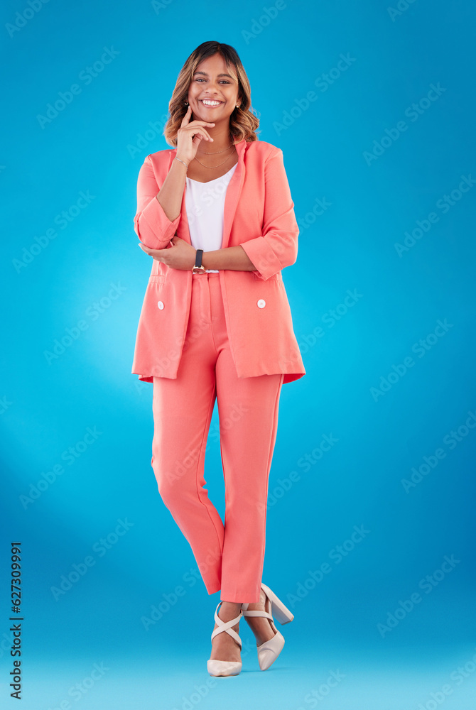 Woman, fashion and suit in studio portrait with arms crossed, style and confident for job by blue ba