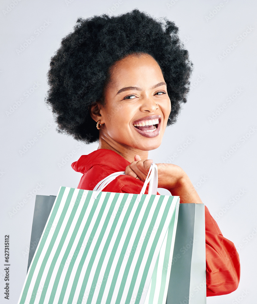 Shopping bag, portrait and woman excited for fashion discount, cosmetics sale in retail on a white b