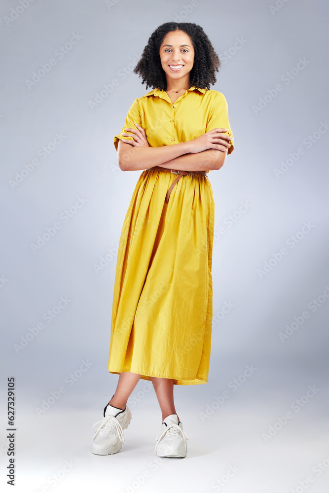 Arms crossed, smile and portrait of business woman in studio for professional, creative and designer