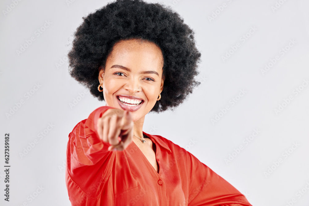 Portrait, smile and pointing with an afro black woman in studio on a white background to vote for yo