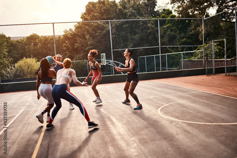 Trying to get through. Cropped shot of a diverse group of sportswomen playing a competitive game of 