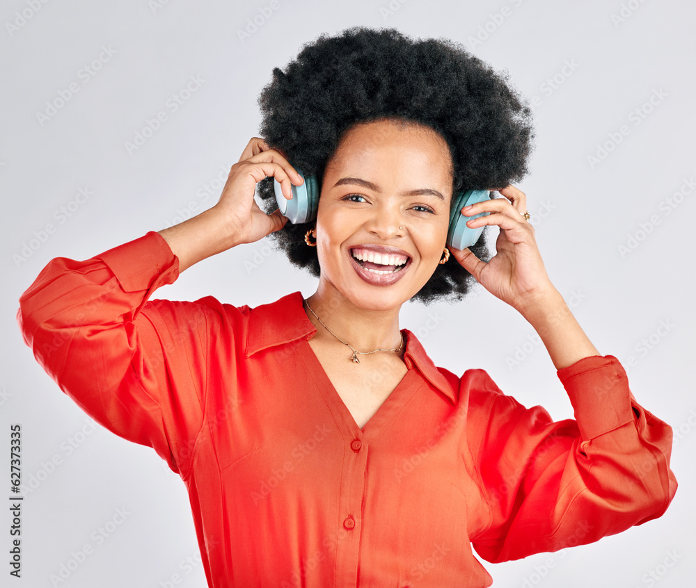 Portrait, black woman and music headphones in studio for podcast, audio and subscription on white ba