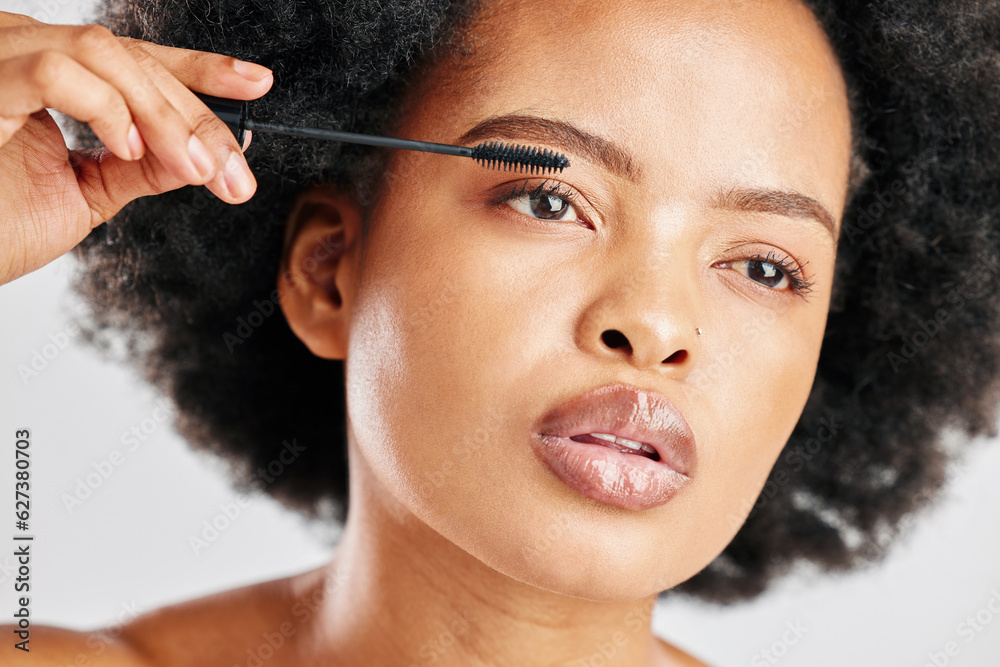 Skincare, cosmetics and eyebrow brush for beauty with african girl in grey studio or background. Mak