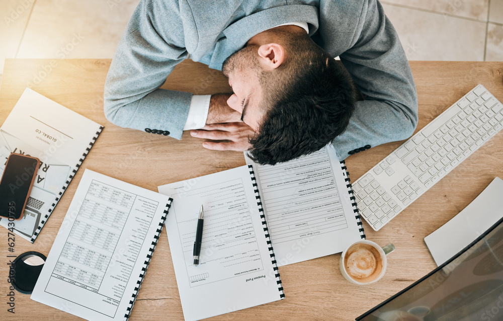 Top view, burnout and tired or man with sleeping at desk and exhausted at finance job. Employee, dep