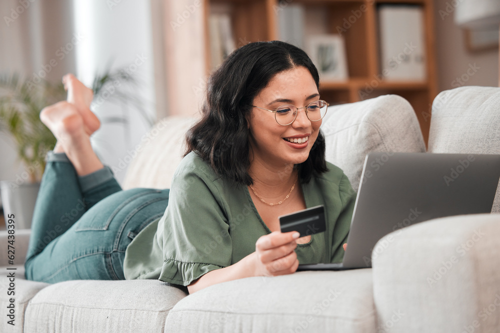 Credit card, computer and woman for home online shopping, e learning and fintech payment on sofa. Re