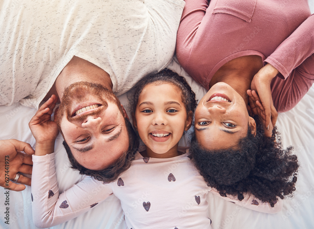 Happy family, smile and portrait on bed at home for quality time, bonding or morning routine. Above,