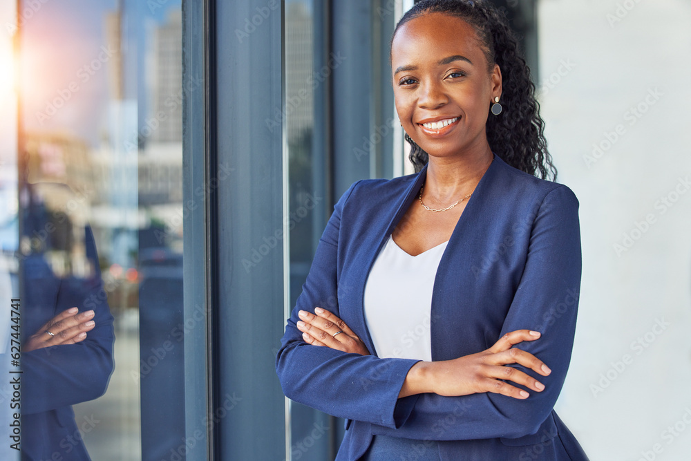 Portrait, window and arms crossed with a business woman standing in her professional office. Smile, 