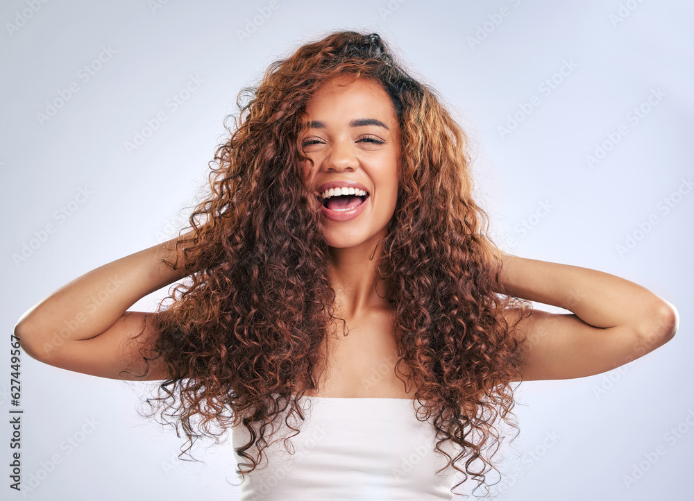 Woman, natural hair and curly hairstyle in studio with smile and face glow. Portrait of African pers